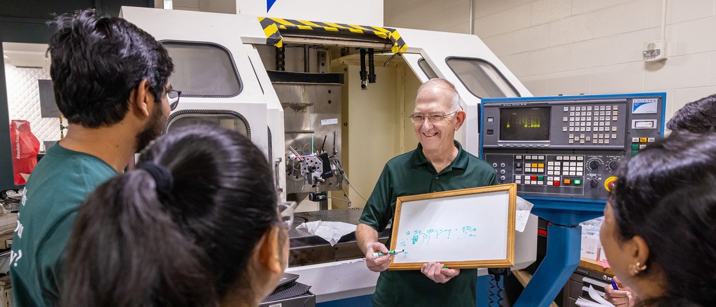 Dr. Miller teaching a group of students